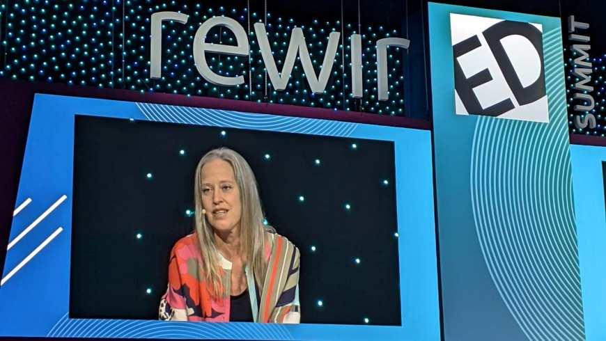 Teach For All CEO Wendy Kopp is seen speaking on a large screen at RewirED 2021